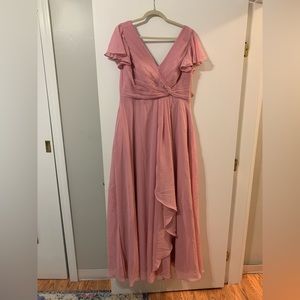 Flowy v-neck chiffon gown w lace up closure back, high leg slit, and pockets!